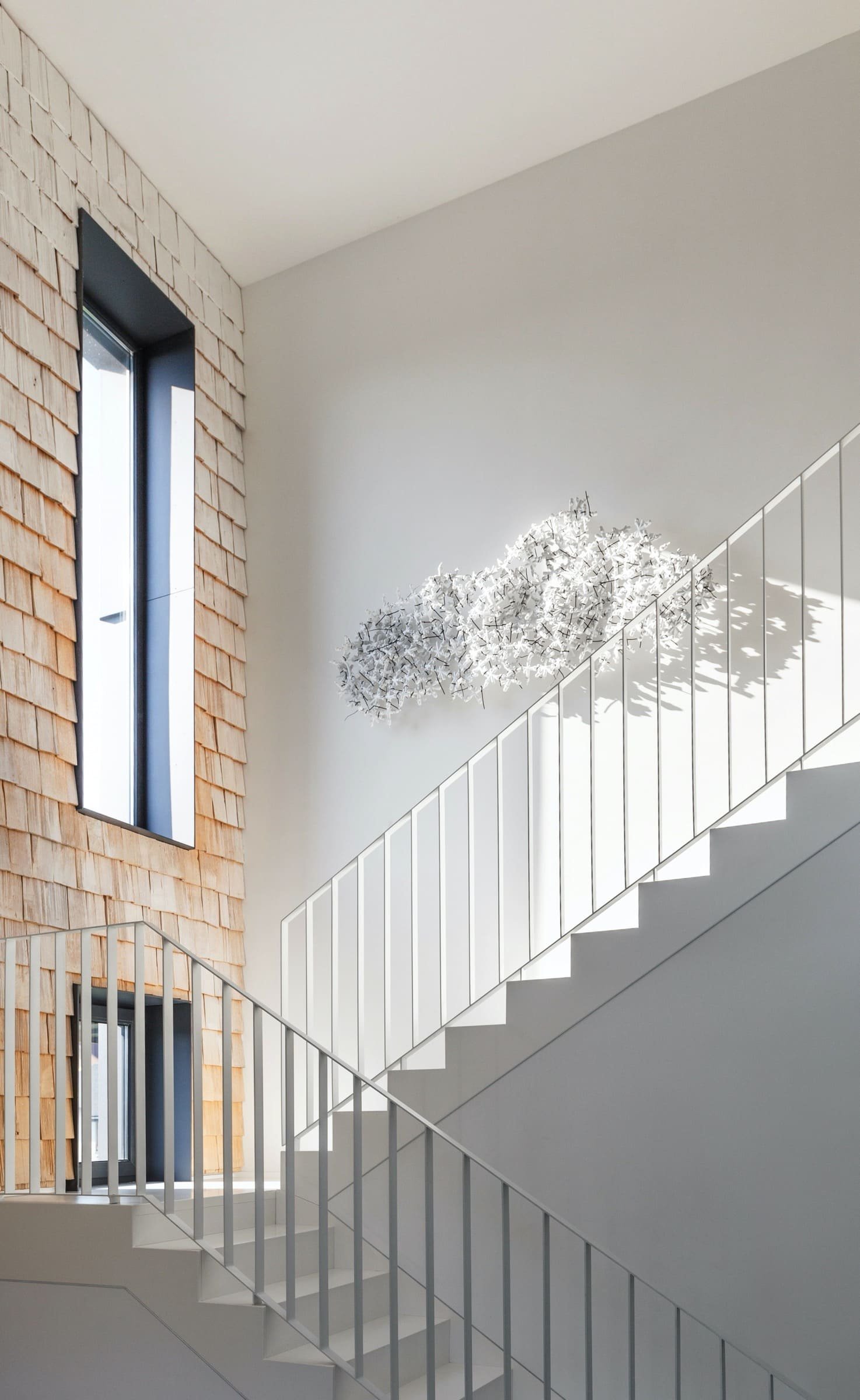 Elegantní interiér domu pro dvě rodiny