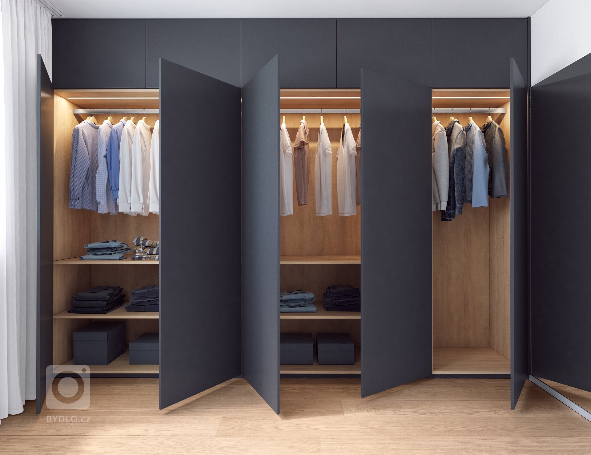 Návrh interiéru bytu pro mladého muže. V interiéru převládá kombinace antracitové barvy s bílou, světlým dřevodekorem a šedou. Doplňkou barvou je tmavě modrá,…