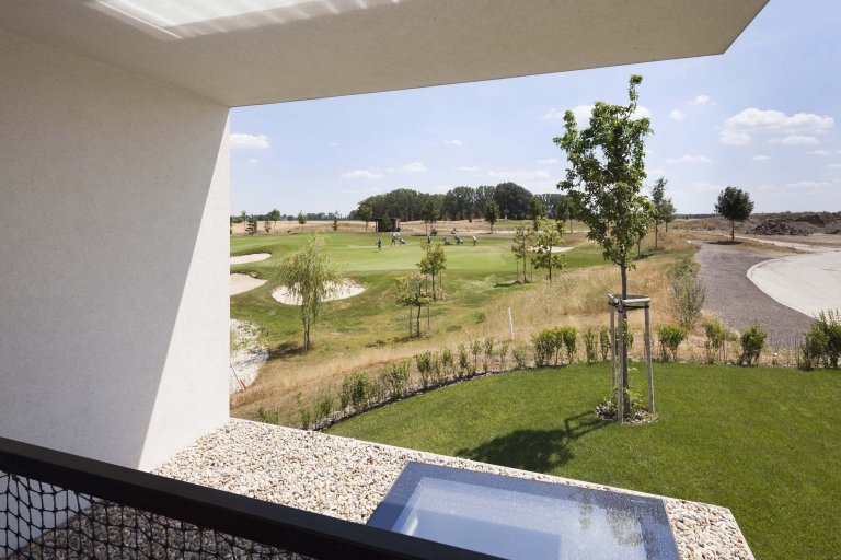 Bydlení uprostřed golfového hřiště